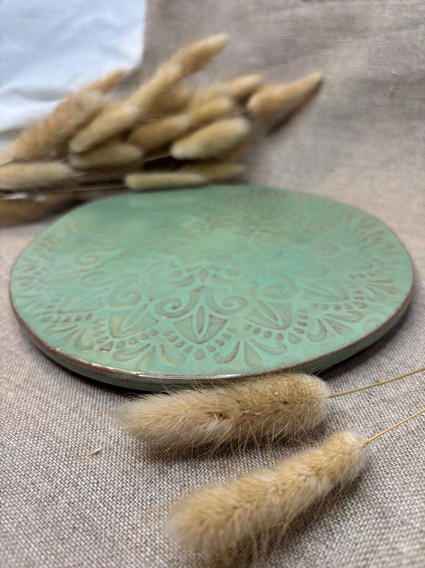 Dessous de plat vert d'eau